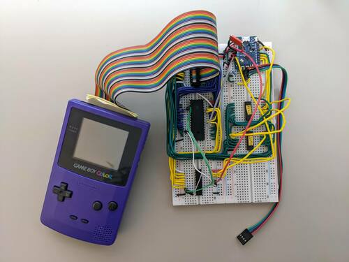 A GameBoy connected to a breadboard implementing a WiFi enabled cartridge
